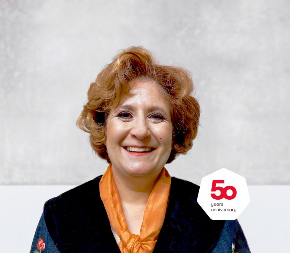 Portrait of Patrizia Christen, Collection Specialist, EOS Switzerland in front of a bright background