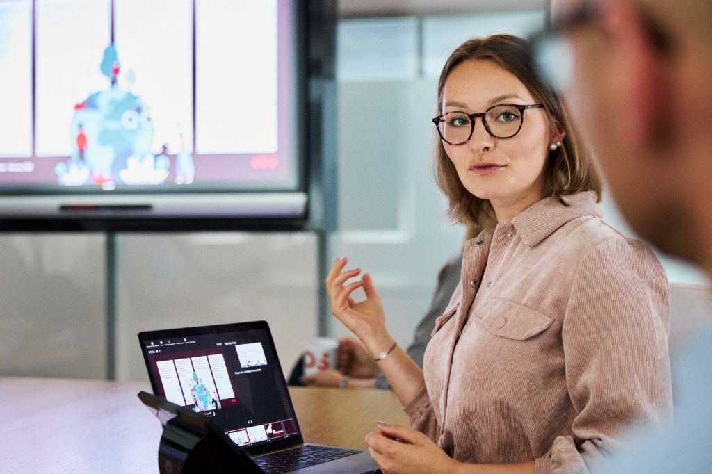 EOS employee presents a topic to customers