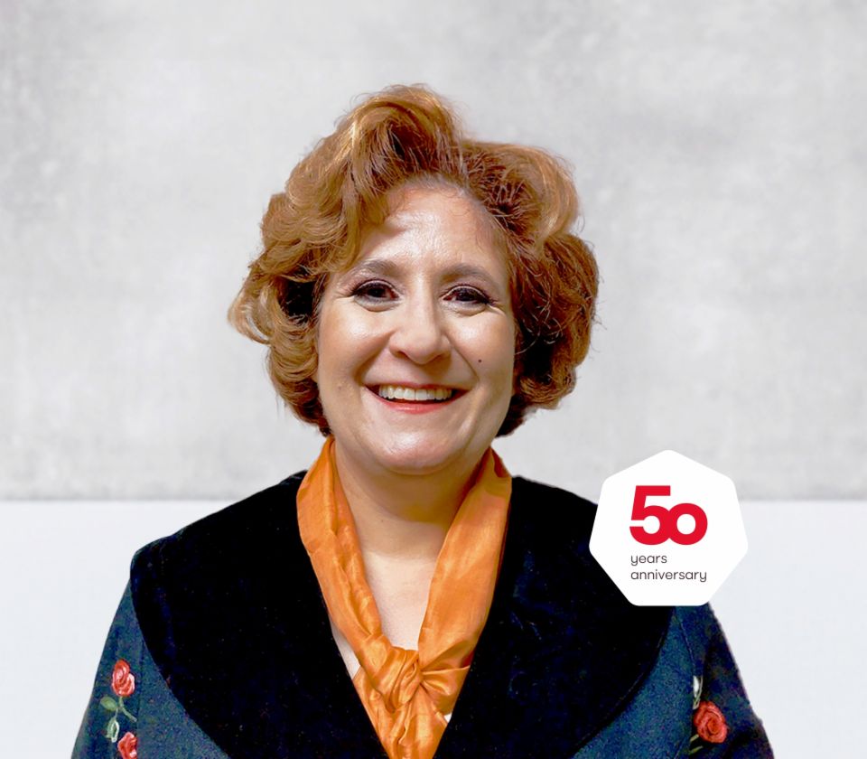 Portrait of Patrizia Christen, Collection Specialist, EOS Switzerland in front of a bright background