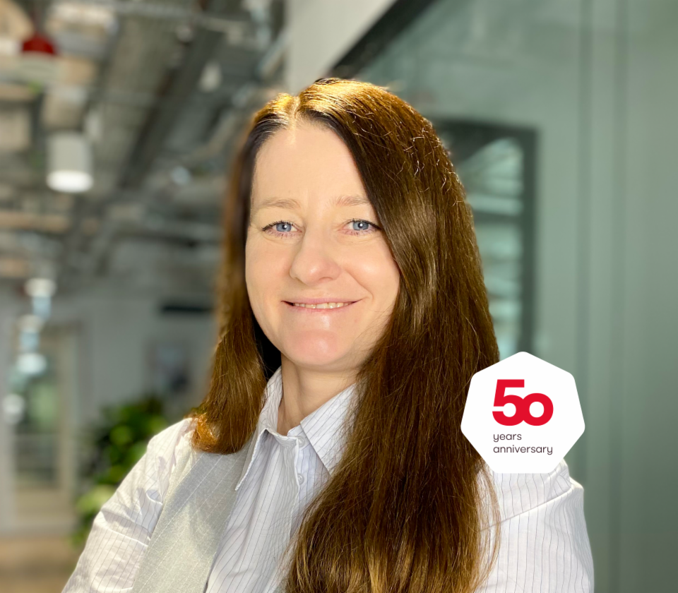 Portrait of Agnieszka Chromińska, Director Unsecured Receivables Department, EOS Poland in an office context